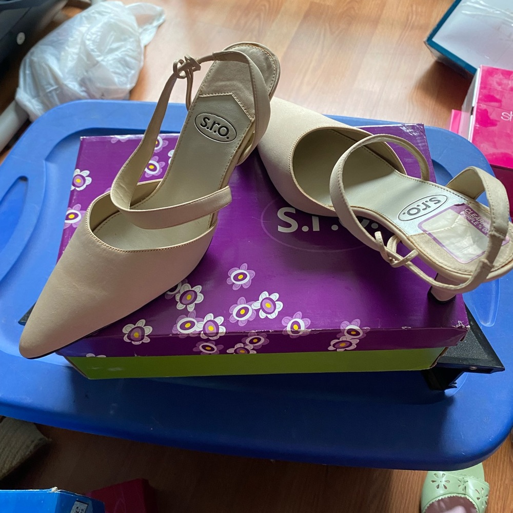 Tan heel with strap